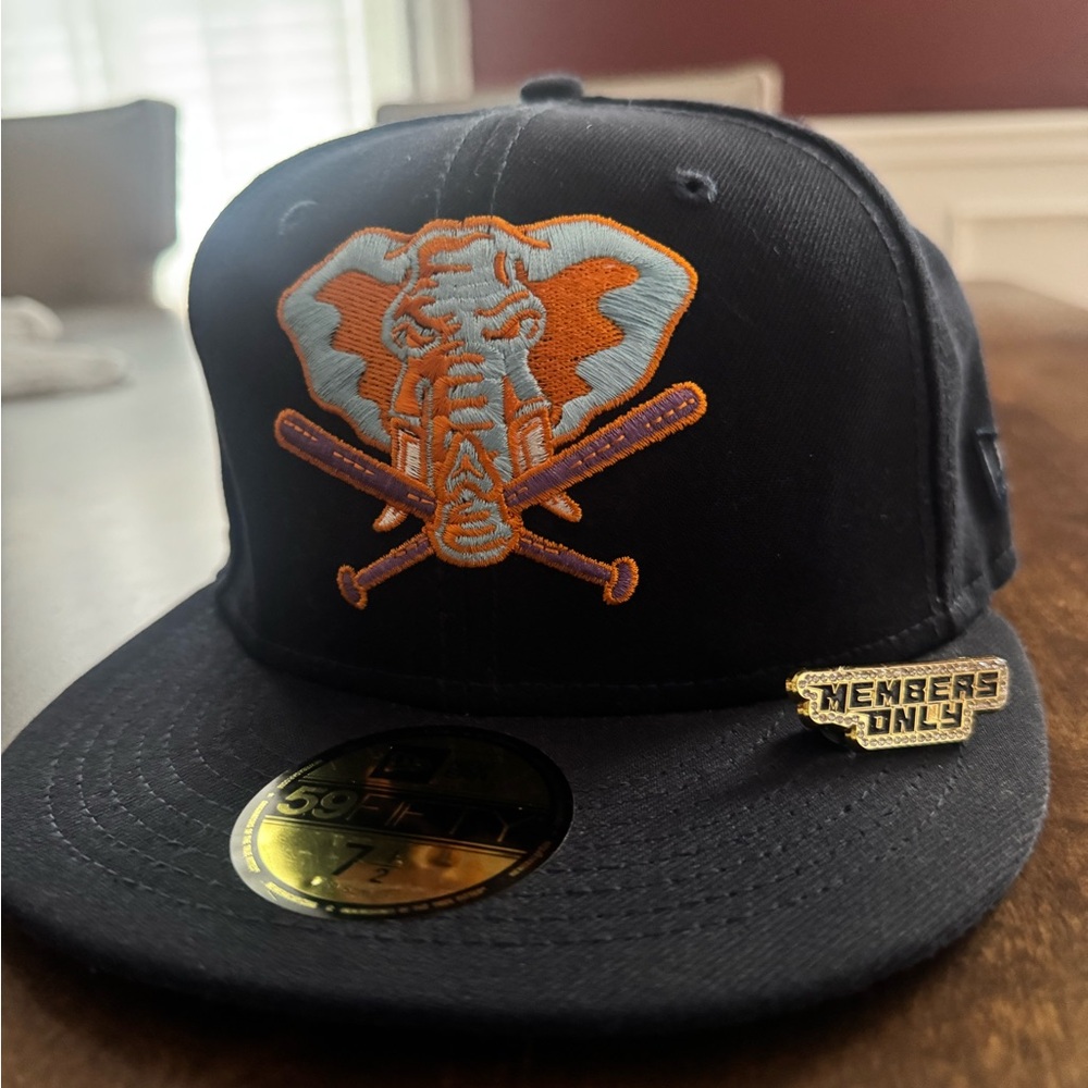 New Era Black Hat with Orange and Blue Elephant Logo